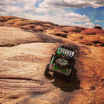 Y-Strap on green jeep in Moab